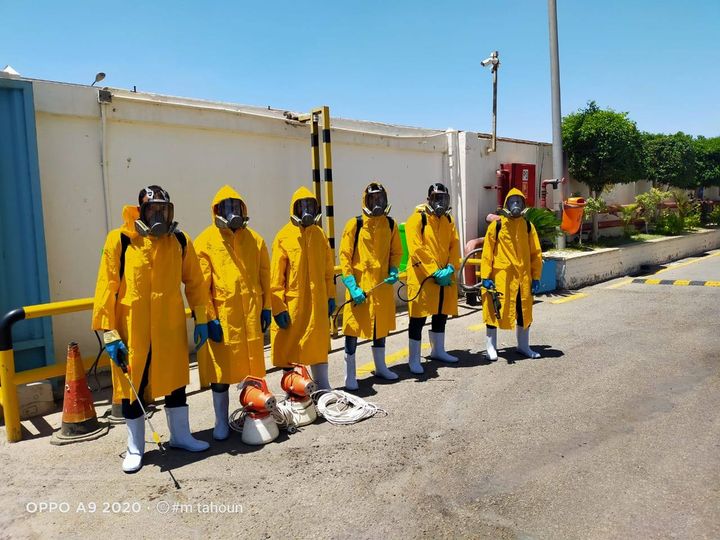 hazmat suit yellow pest control worker